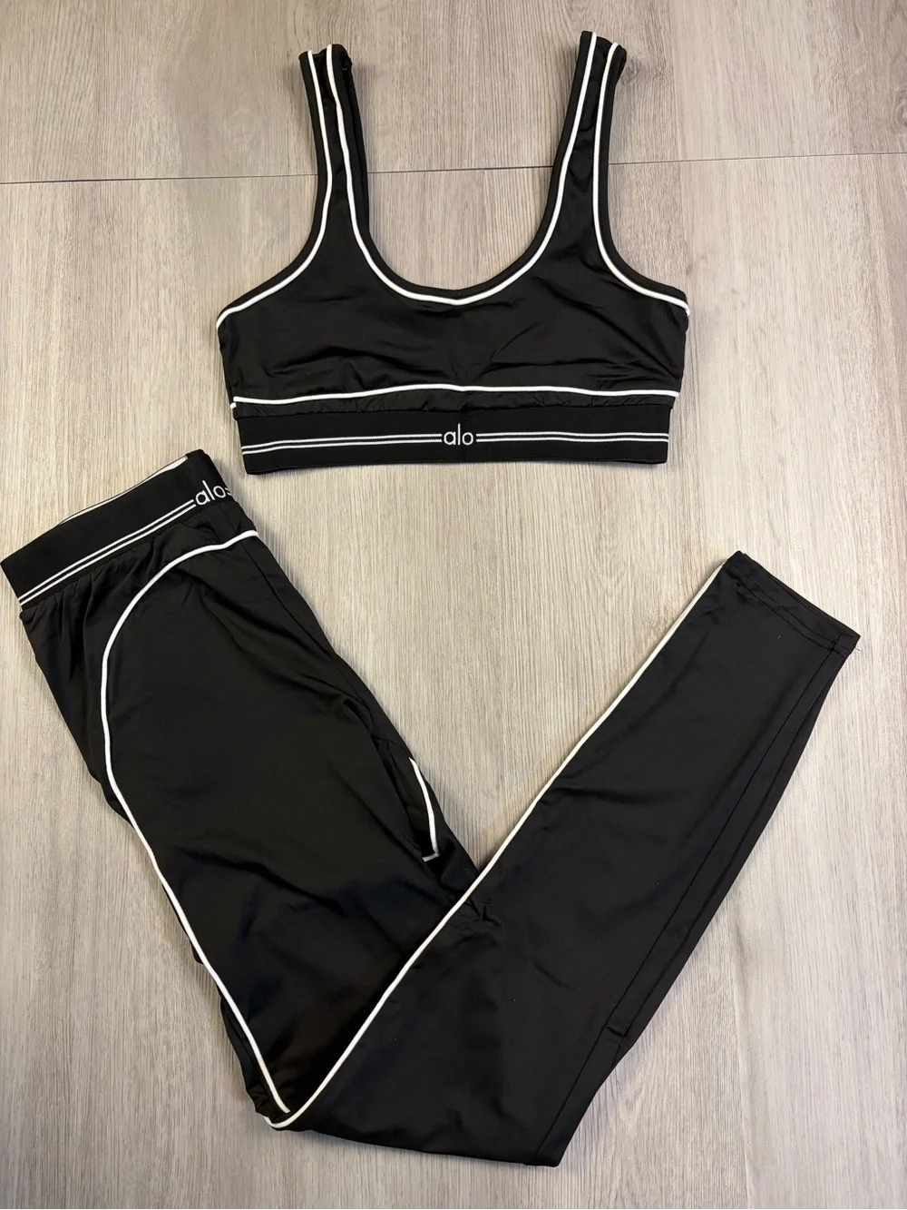ALO Yoga Black Track Pants & Piped Sports Bra Set with White Trim